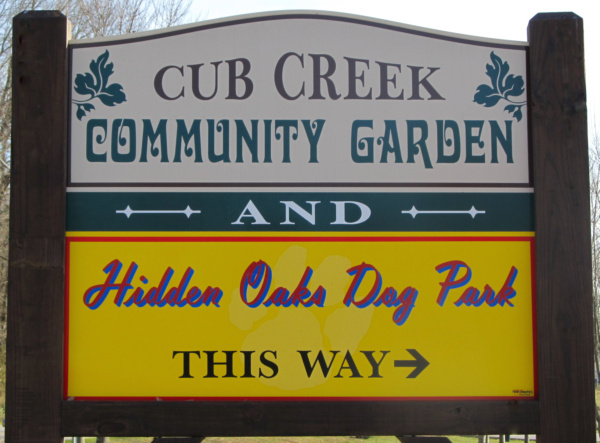 Entrance sign for Community Garden & Dog Park